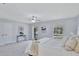 Spacious primary bedroom with two windows and neutral decor at 140 Sweet Bay Cir, Lake Mary, FL 32746