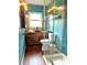 Stylish bathroom with rustic vanity, glass shower, vessel sink, and modern lighting at 1405 Periwinkle Ave, Deland, FL 32724