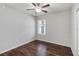 Comfortable bedroom features a ceiling fan and natural light from the window at 141 Sandestin Dr, Haines City, FL 33844