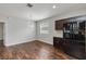 Bright dining area features dark cabinets, stylish countertops, and plenty of room for gatherings at 141 Sandestin Dr, Haines City, FL 33844