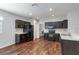 Well-equipped kitchen with stainless steel appliances, dark cabinetry, and light countertops at 141 Sandestin Dr, Haines City, FL 33844