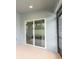 The screened-in patio is attached to the house with a sliding door at 141 Sandestin Dr, Haines City, FL 33844