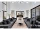 Bright living room with high ceilings, fireplace, and dual sofas creates a welcoming space at 14106 Eliot Ave, Orlando, FL 32827