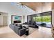 Bright living room with fireplace and backyard views creates an inviting and spacious atmosphere at 14106 Eliot Ave, Orlando, FL 32827