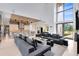 Open-concept living room with fireplace, and seamless flow to the kitchen and dining area at 14106 Eliot Ave, Orlando, FL 32827