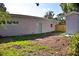 Exterior view of backyard with the shed and a new fence at 1510 Live Oak St, New Smyrna Beach, FL 32168