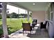 Cozy front porch featuring a nice seating area and shade at 1510 Live Oak St, New Smyrna Beach, FL 32168