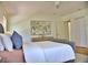 Spacious main bedroom features hardwood floors, modern decor, and a serene, welcoming atmosphere at 1510 Live Oak St, New Smyrna Beach, FL 32168