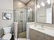 Elegant bathroom featuring a glass shower, modern fixtures, and stylish tile work at 16246 Ravenna Ct, Montverde, FL 34756