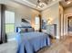 Serene bedroom with ample natural light, creating a peaceful retreat for relaxation and rest at 16246 Ravenna Ct, Montverde, FL 34756