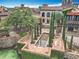 Tranquil courtyard showcasing lush landscaping and a central water feature at 16246 Ravenna Ct, Montverde, FL 34756