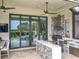 Well-equipped outdoor kitchen with modern appliances and a seamless indoor-outdoor living at 16246 Ravenna Ct, Montverde, FL 34756