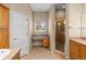 Bathroom featuring a vanity area and step-in shower at 16729 Tall Grass Ln, Clermont, FL 34711