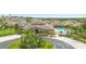 Community clubhouse offers a pool, landscaping, and a welcoming entrance at 17404 Chateau Pine Way, Clermont, FL 34711
