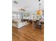 Living and dining area with modern furnishings, ceiling fan and natural light at 17404 Chateau Pine Way, Clermont, FL 34711