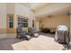 This cozy brick patio offers seating and a barbecue grill for outdoor entertaining at 17404 Chateau Pine Way, Clermont, FL 34711
