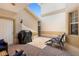 Private patio with brick paving, outdoor seating, and a grill, perfect for relaxing and entertaining at 17404 Chateau Pine Way, Clermont, FL 34711