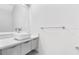 Modern bathroom with a square white ceramic sink and grey cabinetry at 2041 Greenbriar Ter, Davenport, FL 33837