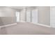 Neutral-toned bedroom featuring plush carpeting, recessed lighting, and ample closet space at 2041 Greenbriar Ter, Davenport, FL 33837