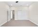 Bedroom with neutral carpet features large closet and ceiling fan at 2041 Greenbriar Ter, Davenport, FL 33837
