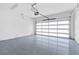 Spacious two car garage with epoxy floor and overhead garage door at 2041 Greenbriar Ter, Davenport, FL 33837