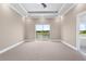 Spacious main bedroom with tray ceilings, recessed lights, and carpet floors at 2041 Greenbriar Ter, Davenport, FL 33837