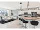 Stylish kitchen with granite countertops, stainless steel appliances, and a functional island at 2215 Upland Ln, Apopka, FL 32712
