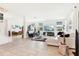 Spacious living room with tile floors, neutral decor, lots of natural light, and open-concept design at 2215 Upland Ln, Apopka, FL 32712