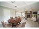 Bright and airy living room with a decorative brick fireplace and tile flooring at 2307 Freemason St, Lakeland, FL 33801