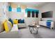 Inviting living room with comfortable seating, modern entertainment center, and stylish decor at 2524 Raghav Trl, Tavares, FL 32778