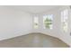 Bright bedroom with tile floor and windows at 2533 Raghav Trl, Tavares, FL 32778