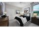 A bedroom featuring a bear-themed wallpaper, modern furnishings, and a cozy bed with stylish linens at 3114 Suraj Cir, Tavares, FL 32778