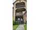 Inviting two-story condo featuring private balconies, brick accents, and well-maintained landscaping at 320 Forestway Cir # 107, Altamonte Springs, FL 32701