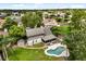 Aerial view of house with backyard pool and scenic surroundings at 359 Westwind Ct, Lake Mary, FL 32746