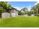 A large backyard with a shed, pool, and lush lawn at 359 Westwind Ct, Lake Mary, FL 32746
