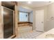 Clean bathroom with tiled bathtub and shower combination and privacy block window at 359 Westwind Ct, Lake Mary, FL 32746