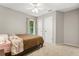 Comfortable bedroom with a queen-sized bed, large window, and ample closet space at 359 Westwind Ct, Lake Mary, FL 32746