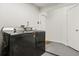 Bright laundry room with modern washer and dryer units at 359 Westwind Ct, Lake Mary, FL 32746