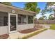 Screened-in patio attached to the house with access to the backyard at 359 Westwind Ct, Lake Mary, FL 32746