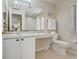 Bright bathroom featuring a granite countertop, mosaic backsplash, and good lighting at 3938 Calabria Ave, Davenport, FL 33897