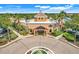 Exterior shot of Regal Palms Clubhouse with fountain at 3938 Calabria Ave, Davenport, FL 33897
