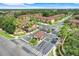 Aerial view of gated community entrance with lush landscaping at 3938 Calabria Ave, Davenport, FL 33897