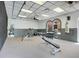 Community gym with free weights, benches, and a punching bag at 3938 Calabria Ave, Davenport, FL 33897