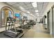 Community gym featuring elliptical machines, treadmills, and large windows at 3938 Calabria Ave, Davenport, FL 33897