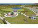 Community park featuring a playground, benches, pond, and gazebo for outdoor enjoyment at 3958 Bigarade Ln, Lake Alfred, FL 33850
