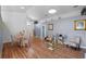 Open-concept living space featuring hard wood floors, modern furnishings and lots of natural light at 404 Obo Dr, Davenport, FL 33896