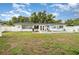 A refreshing pool and manicured green lawn, perfect for outdoor entertaining and relaxing at 4111 Dublin St, Orlando, FL 32812