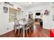 Inviting dining room featuring a wooden table, chairs, and view of the backyard at 4111 Dublin St, Orlando, FL 32812