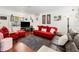 Inviting living room featuring wood floors, comfortable seating, and stylish decor at 4111 Dublin St, Orlando, FL 32812