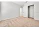 Carpeted bedroom with walk in closet and neutral tones at 437 Caribbean Ct, Kissimmee, FL 34759